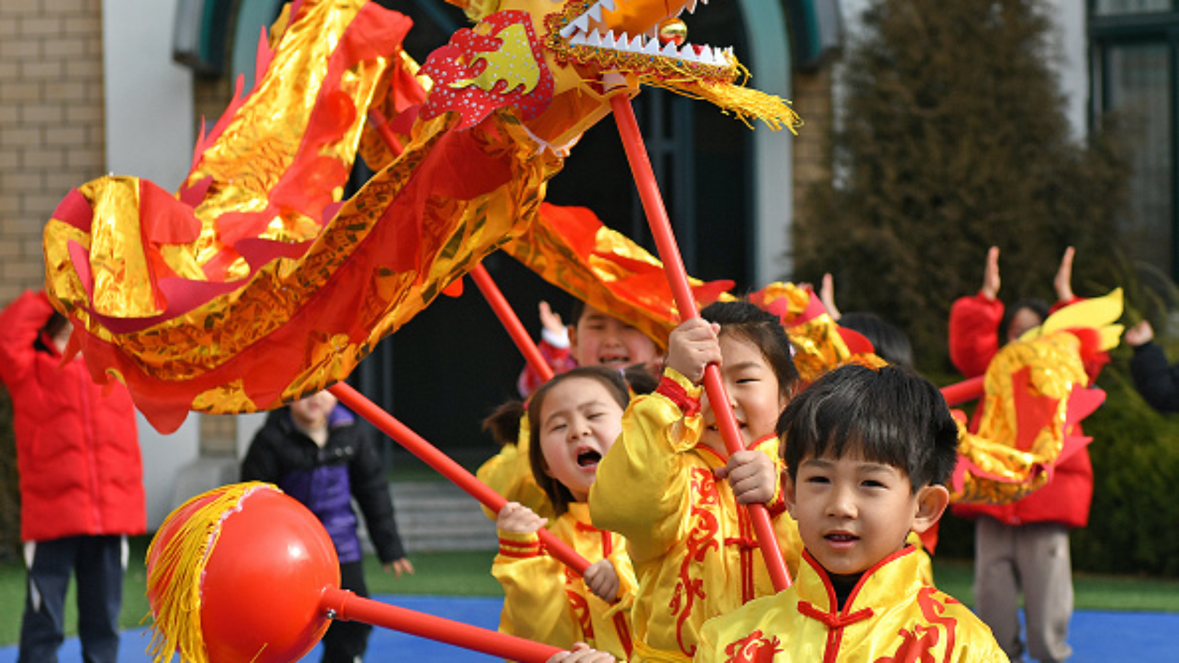 YANTAI, CHINA - JANUARY 16: Children perform dragon dance at a kindergarten ahead of the Chinese New Year, the Year of the Dragon, on January 16, 2024 in Yantai, Shandong Province of China. (Photo by Sun Wentan/VCG via Getty Images)